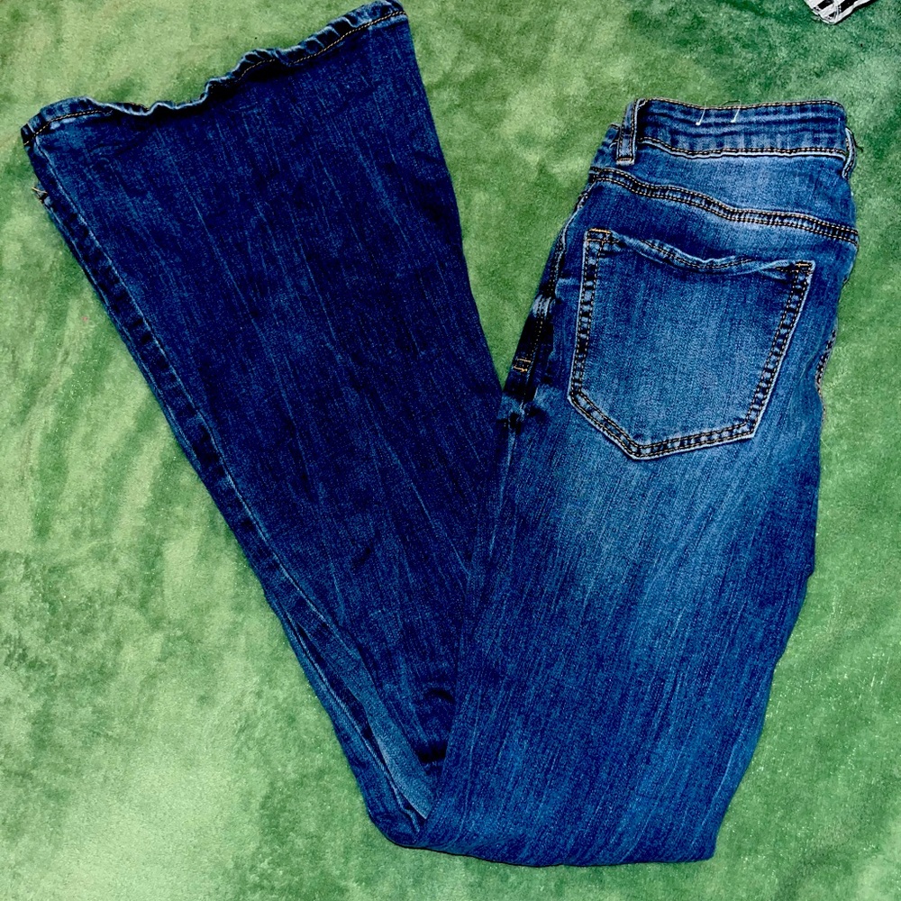 Distressed flair leg jeans